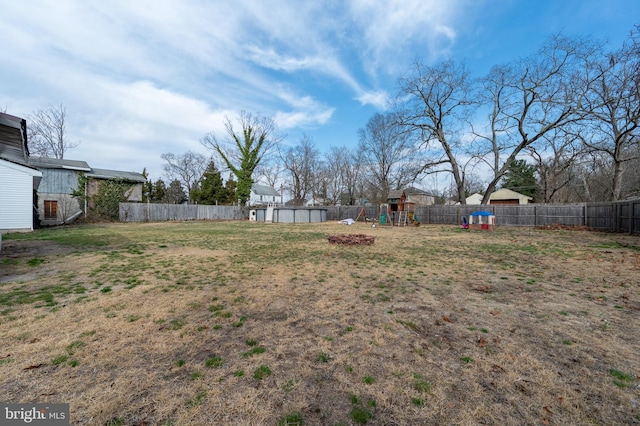 123 S 9th St, Millville, NJ 08332 - view of yard featuring a playground and a fenced backyard