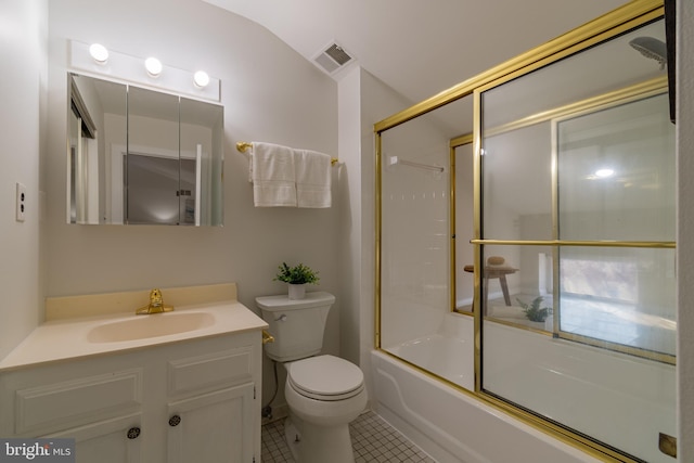 bathroom featuring vanity, visible vents, tile patterned floors, toilet, and combined bath / shower with glass door