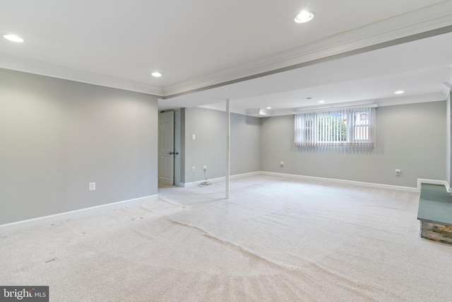 below grade area with light carpet, recessed lighting, crown molding, and baseboards