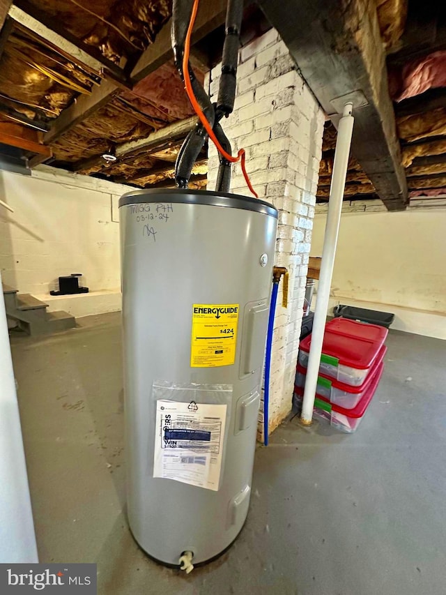 utility room with electric water heater