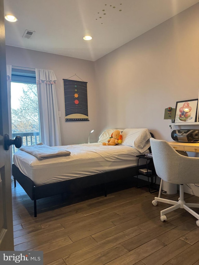 bedroom featuring visible vents, recessed lighting, and hardwood / wood-style floors