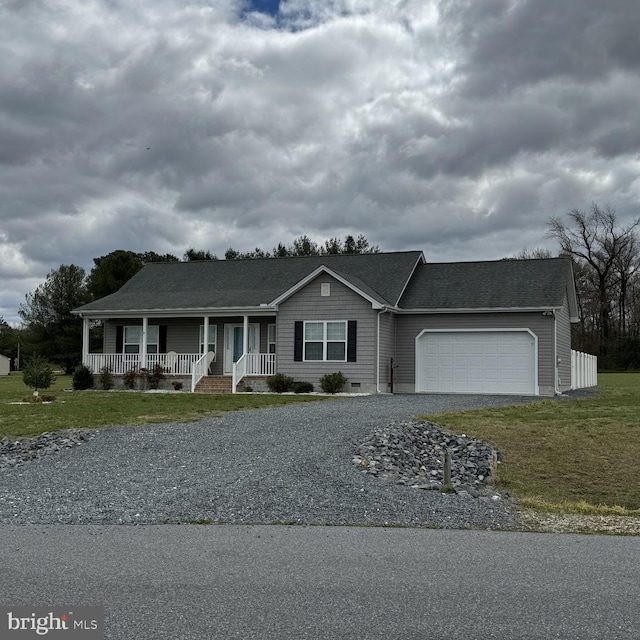 ranch-style house featuring gravel driveway, a porch, a front yard, crawl space, and an attached garage