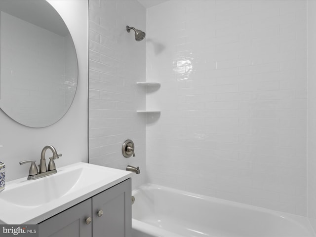 bathroom featuring tub / shower combination and vanity