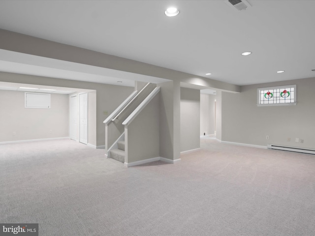 basement with visible vents, carpet, stairs, recessed lighting, and a baseboard radiator