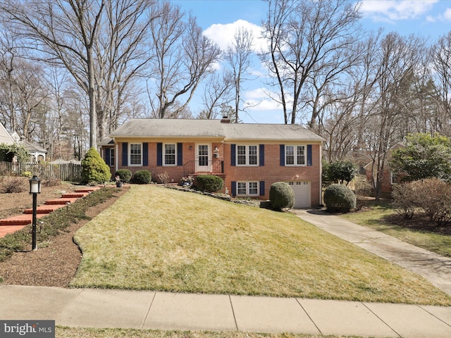 ranch-style home with fence, concrete driveway, a front yard, a chimney, and an attached garage