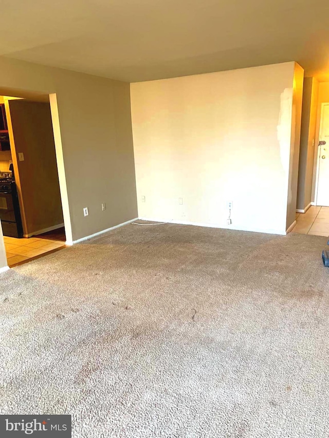 unfurnished room with carpet floors