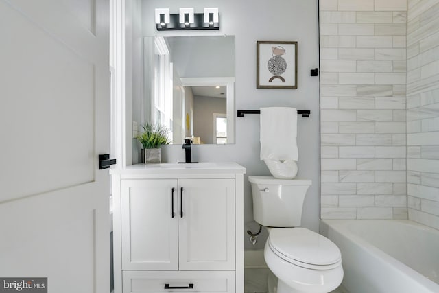 full bathroom featuring vanity and toilet