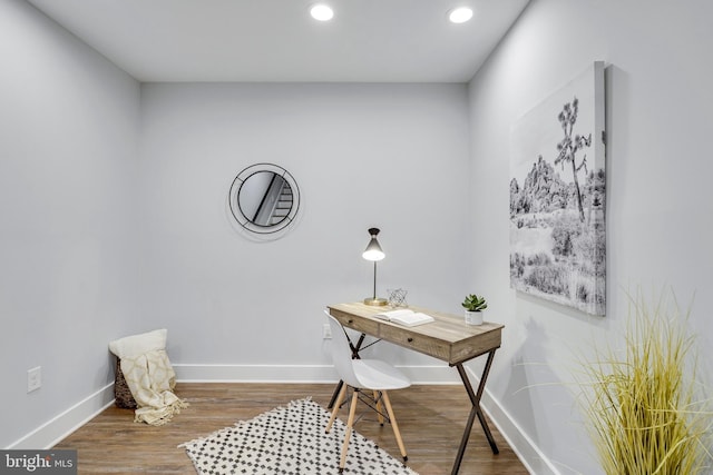 office space with recessed lighting, baseboards, and wood finished floors