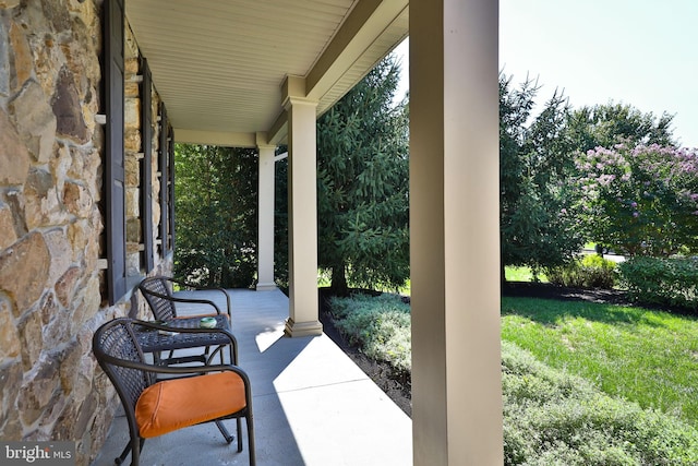 view of patio featuring a porch