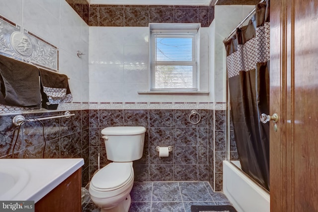 full bath with vanity, tile walls, toilet, and shower / bathtub combination with curtain