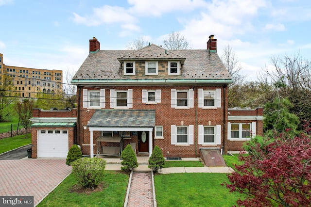 view of front facade featuring a high end roof, brick siding, and a chimney