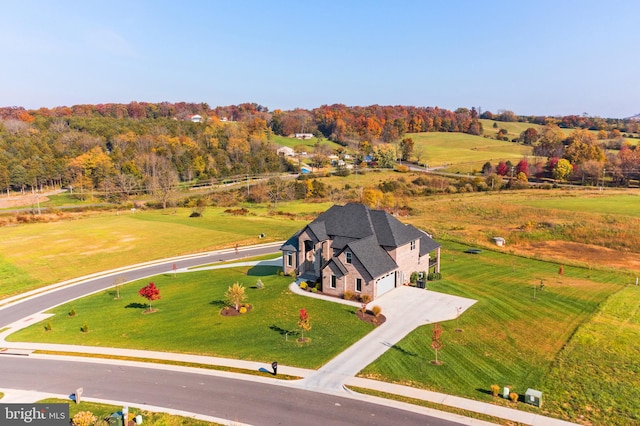 birds eye view of property featuring a rural view