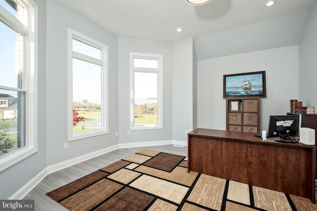 office space with recessed lighting, baseboards, and wood finished floors