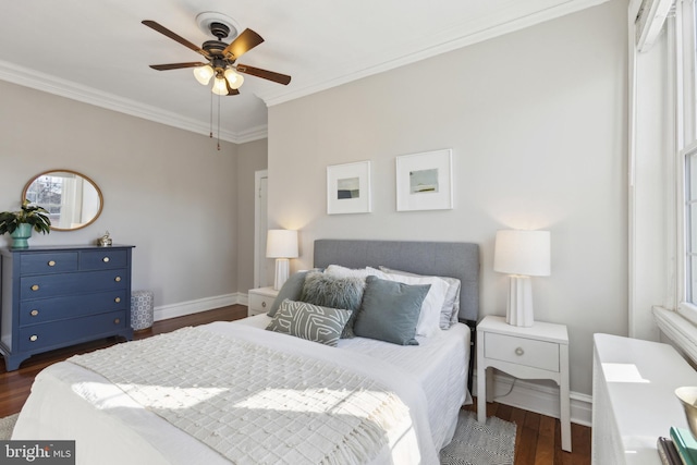 bedroom with dark wood-style flooring, a ceiling fan, baseboards, and ornamental molding