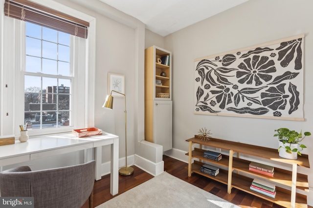 office with baseboards and dark wood finished floors