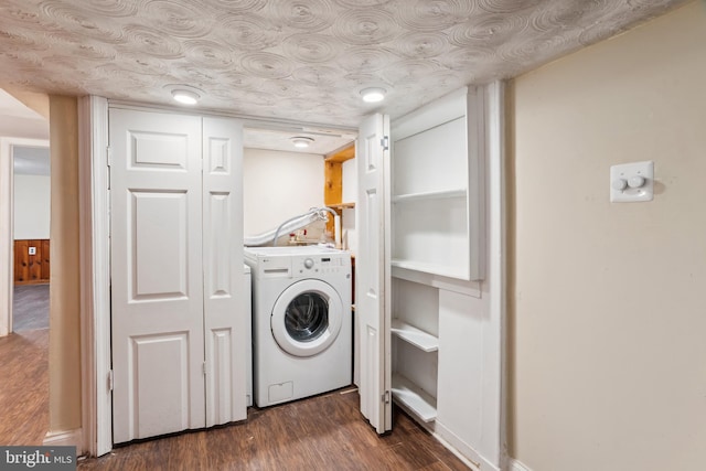 washroom with laundry area, washer / clothes dryer, and dark wood-style floors