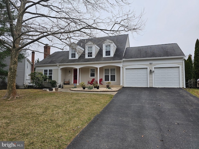 cape cod house with aphalt driveway, a garage, a porch, and a front yard