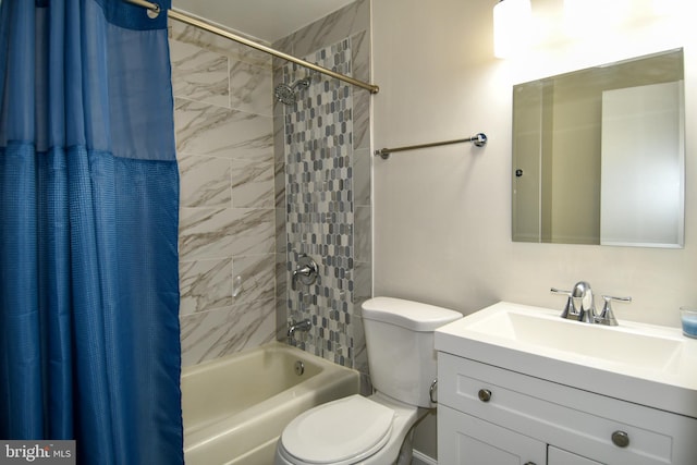 full bathroom with shower / bath combination with curtain, toilet, and vanity