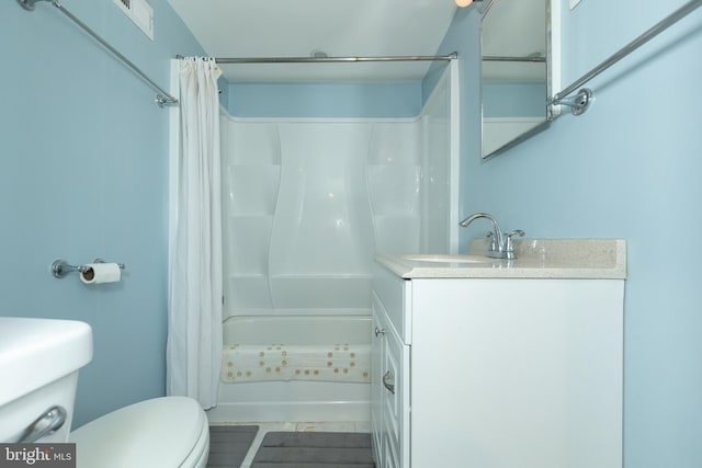 full bathroom featuring toilet, vanity, and shower / tub combo