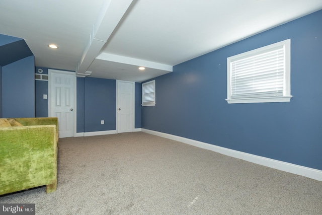 basement featuring recessed lighting, carpet, and baseboards