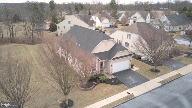 drone / aerial view with a residential view