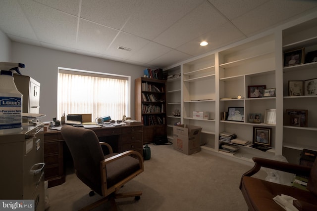 office with light colored carpet and visible vents