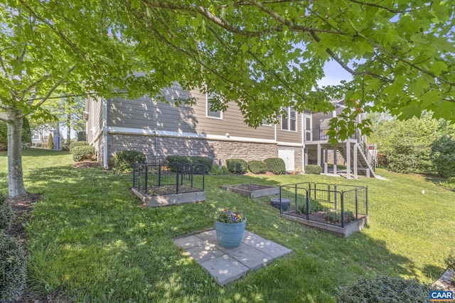155 Highland Cir, Zion Crossroads, VA 22942 - view of yard featuring stairs and a vegetable garden