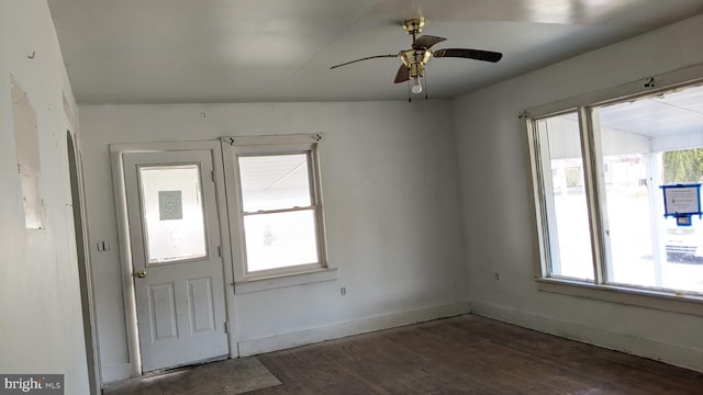 entryway with a healthy amount of sunlight, a ceiling fan, baseboards, and wood finished floors