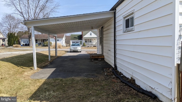 exterior space featuring a carport