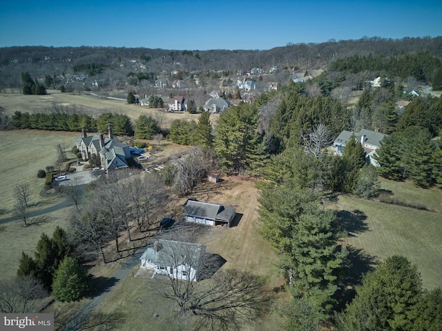 drone / aerial view with a view of trees