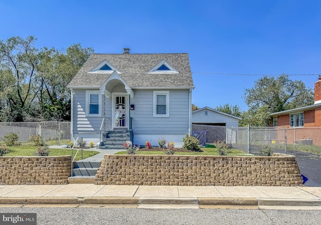 bungalow featuring a garage, a shingled roof, and fence