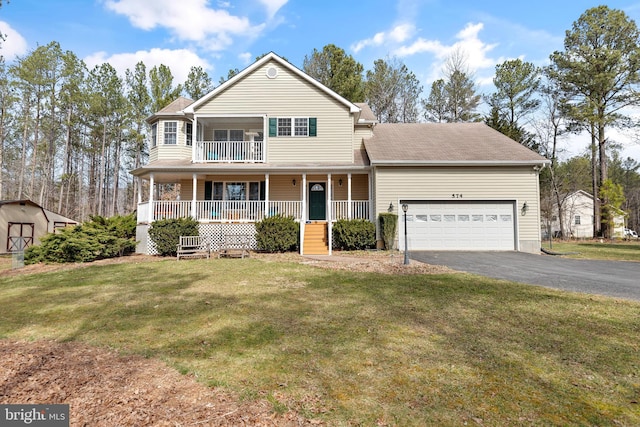 view of front facade with driveway, a porch, an attached garage, a front yard, and a balcony