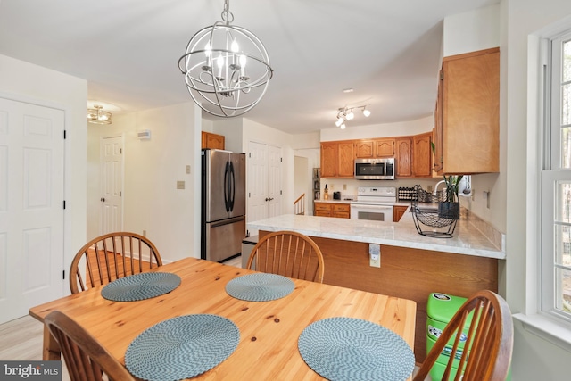 dining room featuring a chandelier