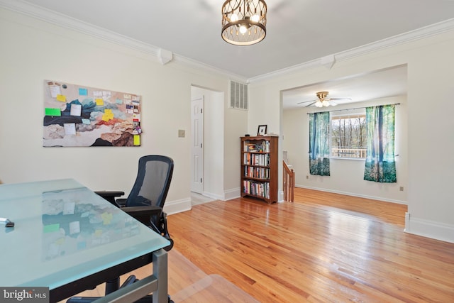 office featuring visible vents, a notable chandelier, light wood-style floors, crown molding, and baseboards