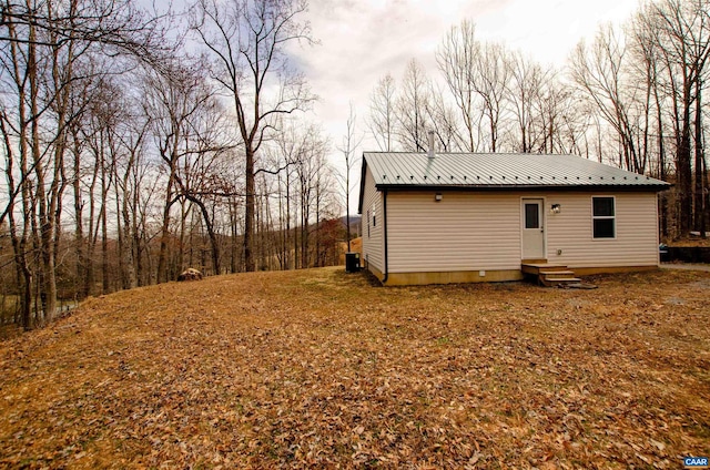 exterior space featuring metal roof