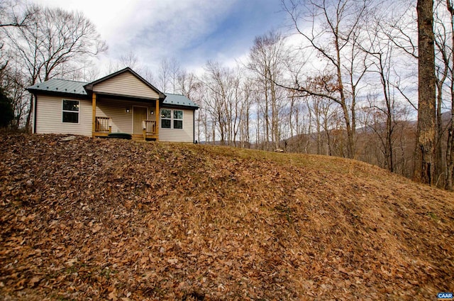 29 Horseshoe Mountain Rd, Roseland, VA 22967 - view of front of home with covered porch and metal roof