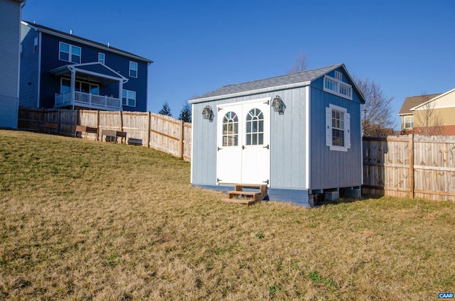 view of outbuilding featuring an outbuilding and a fenced backyard