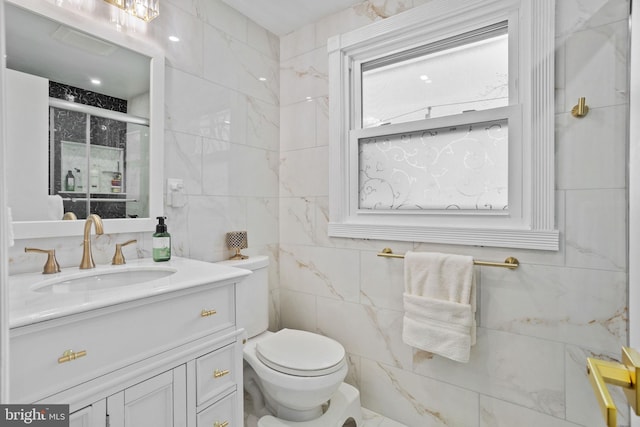 full bath with a shower with door, toilet, tile walls, and vanity