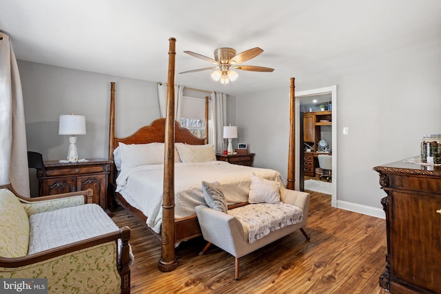 bedroom with ceiling fan, baseboards, and wood finished floors