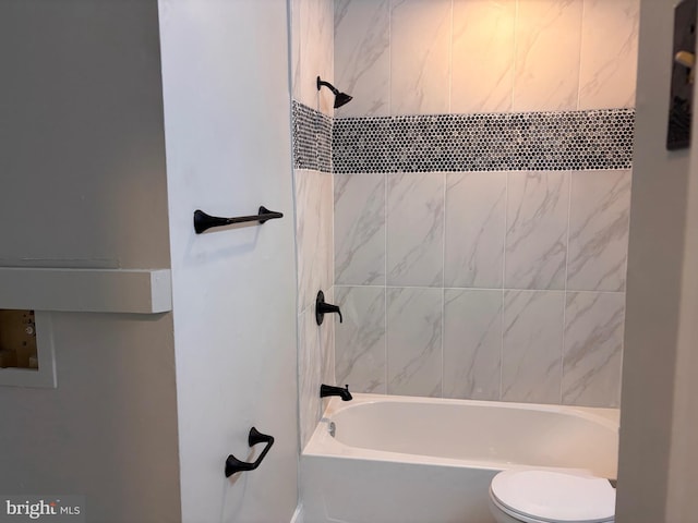 full bathroom with tub / shower combination and toilet