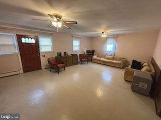 interior space with ceiling fan