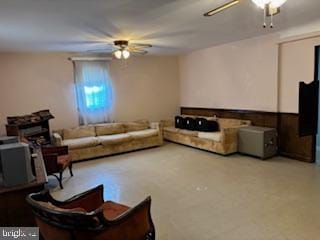 living area featuring ceiling fan