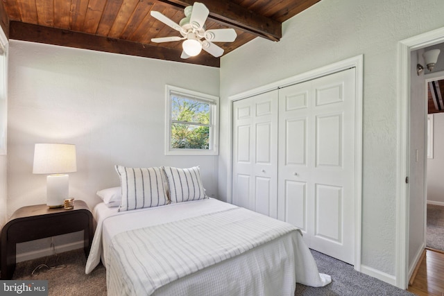7711 Holmes Run Dr, Falls Church, VA 22042 - bedroom with a closet, carpet floors, baseboards, wood ceiling, and lofted ceiling with beams