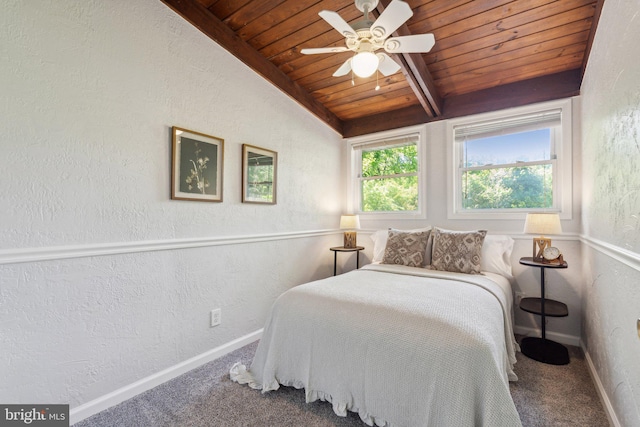 7711 Holmes Run Dr, Falls Church, VA 22042 - carpeted bedroom featuring a textured wall, baseboards, vaulted ceiling with beams, wood ceiling, and a ceiling fan