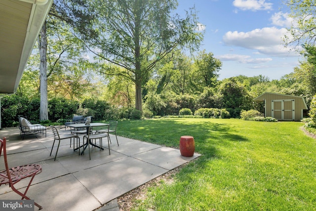 7711 Holmes Run Dr, Falls Church, VA 22042 - view of patio with a storage shed, an outbuilding, and outdoor dining space