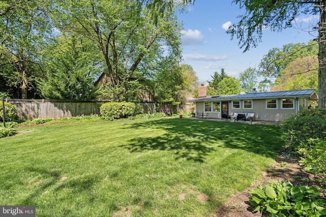 7711 Holmes Run Dr, Falls Church, VA 22042 - view of yard featuring a patio and a fenced backyard
