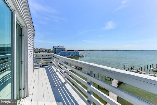 balcony featuring a water view