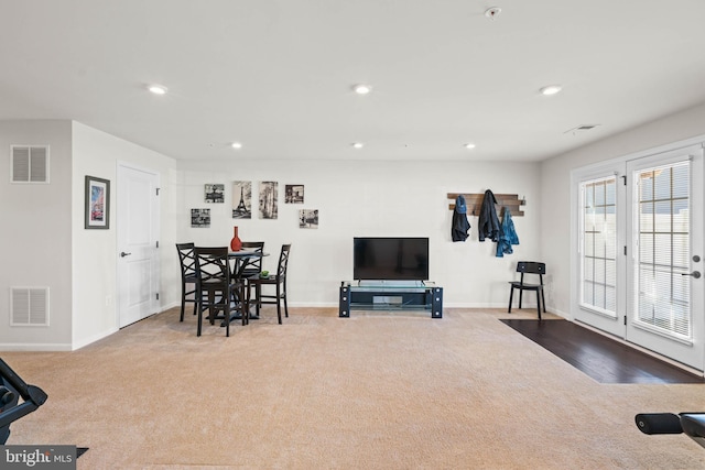 interior space with recessed lighting, visible vents, and baseboards