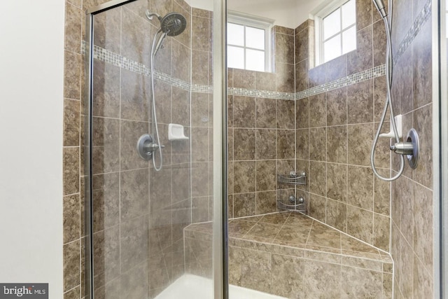 full bathroom featuring a stall shower