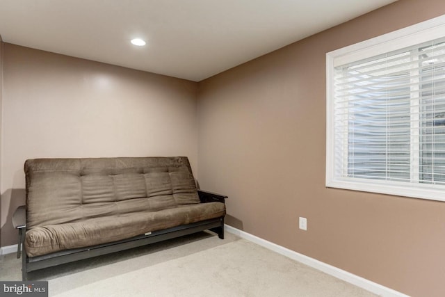 living area featuring carpet flooring, recessed lighting, and baseboards